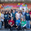 Parte del equipo de la LBV junto a referentes del barrio en la reapertura de El Rincón de la Familia