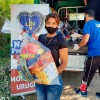 Familias de bajos recursos económicos reciben canastas de alimentos no perecederos.