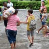 Rio de Janeiro, RJ — Mãe e filho de Praça Seca, na zona oeste do RJ, felizes com a ajuda da LBV, garantindo um natal mais farto para todos.
