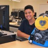 12-year-old Francisco from the Oliver St. School excited to have received a brand new backpack from the LGW.