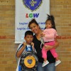 The Sinche family excited to have their new backpack provided by the LGW.