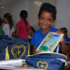 Senador Rui Palmeira, AL - O pequeno Carlos Antonio, 7 anos, é estudante da Escola Vereador Fernando Nepomuceno, exibiu os itens que integram os kits pedagógicosque ganhou da LBV para mais um ano letivo.