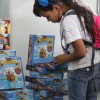 O kit Os Milagres de Jesus, do selo Soldadinho de Deus, chama atenção de crianças que visitam o evento literário