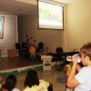 Florianópolis, SC — As crianças acompanharam as palavras do criador do Fórum, José de Paiva Netto.
