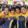 Natal, RN - Atendidos exibem o kit de materiais pedagógicos que receberam da Instituição. O benefício não só as auxiliará na escola, como também contribuirá para a diminuição das despesas do lar.