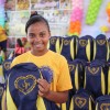 Natal, RN - Felizes, atendidos pelo programa Criança: Futuro no Presente! exibem os kits de material escolar distribuídos pela Legião da Boa Vontade.