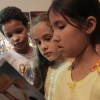 São Paulo, SP — Durante o Fórum, crianças leem segundo volume da série Os Milagres de Jesus, lançamento durante o evento.
