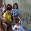 Franca, SP — Momento em que a fita inaugural é descerrada por pessoas de diferentes gerações, representando todos os que cultivam o Ideal de Boa Vontade.
