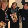 Adriana Parmegiani (M), from the LGW, hands out the GOOD WILL Women magazine to Olga Pasko (L), Head of the Women’s Association of Ukraine, and to Inna Mikhno, Board Member of the Women’s Association of Ukraine. (Photo: LGW)