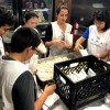 LGW and WHAO volunteers prepare food for the Back-to-School Festival.
