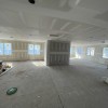 Interior walls and ceiling are finished in sheetrock.
