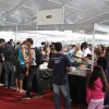 Leitores de todas as idades buscam novidades literárias no estande da WRC na 31a edição da Feira do Livro de Brasília.