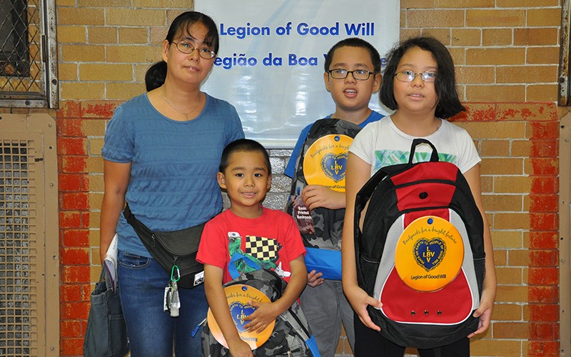 The Aguirre family is excited to have their brand new backpacks and supplies provided by the LGW!