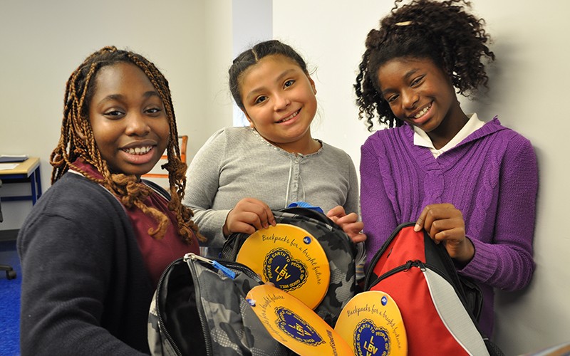 Students at the Lincoln Avenue School in Orange, New Jersey recieve school supplies to start the school year through the LGW's Backpacks for a Bright Future campaign.